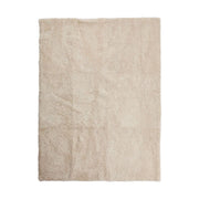 Tapis design en peau de mouton bouclée à laine courte